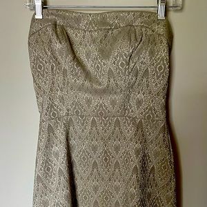 Above the knee, side zip, size 2.